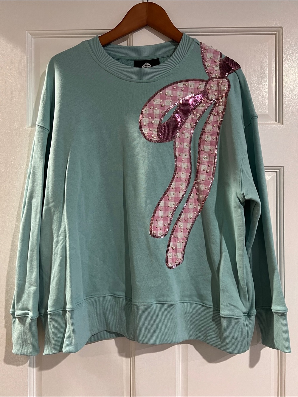 Mint Green Crewneck Sweatshirt with Pink Sequin Ribbon Detail